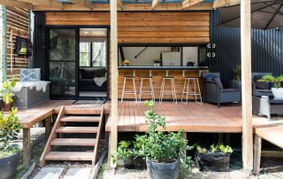 An outdoor living space of a tiny home