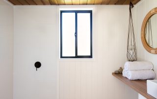 A bathroom with a wooden interior